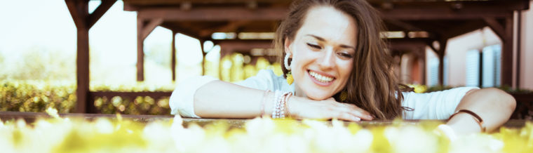 Woman Smiling After Getting Individual Health Insurance in Greeley, Fort Collins, Longmont, Loveland, and Windsor